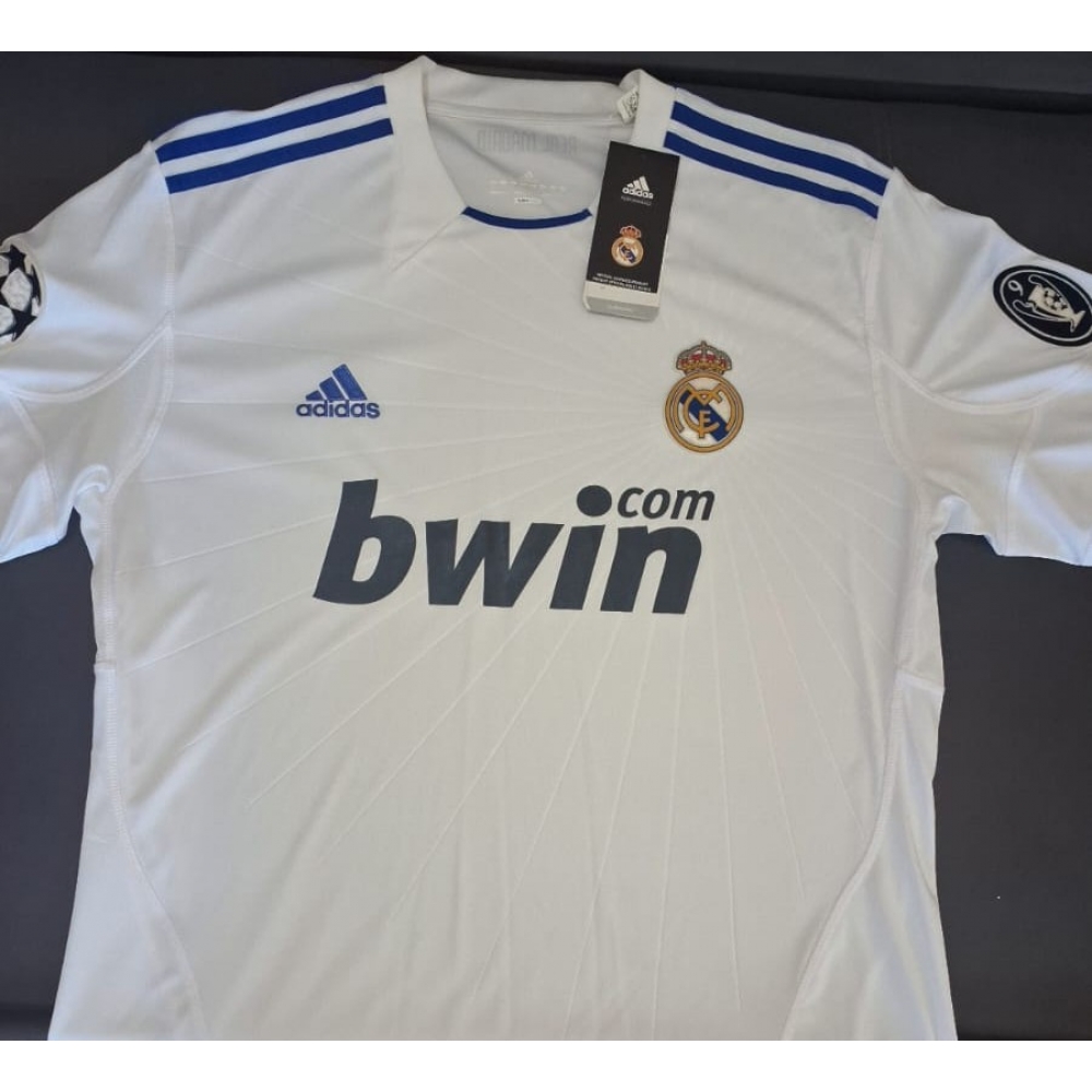 Camisa Real Madri 2010-2011 Exclusiva Champions League + Capa nylon + Cabide Adidas + patch da Liga dos Campeões da UEFA Cod.10777